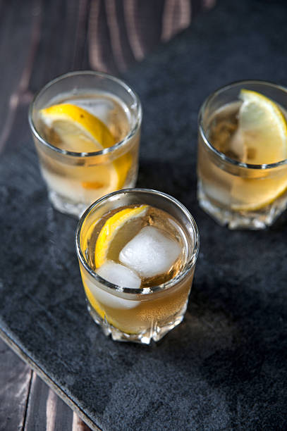 istock Alcohol cocktail with brandy, whiskey, lemon and ice 609791880