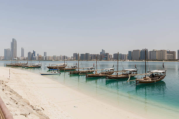 istock Abu Dhabi Cityscape with Beach and Boats, UAE 609792702