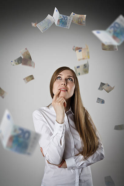 istock Woman in white and Euro. 609796592