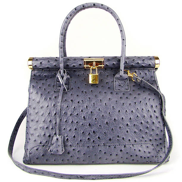 istock Gray ostrich leather handbag on white background 609798390