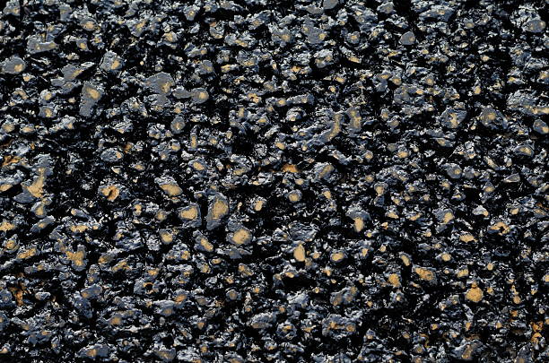 istock Background of new and fresh black asphalt tar 609799072
