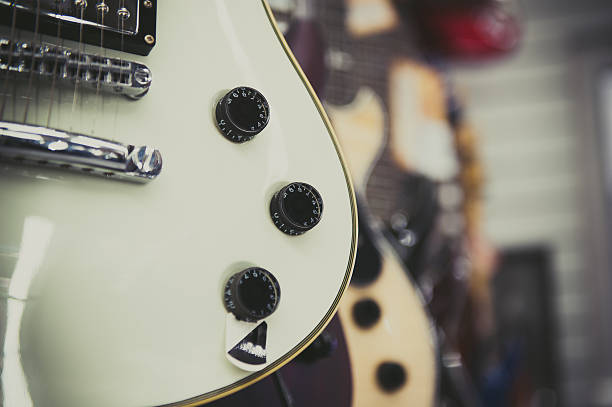 istock White electric guitar body detail 609799554
