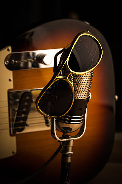istock Still Life of Microphone and Guitar with Sunglasses 609801608