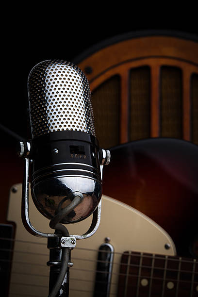 istock Microphone and Guitar with Vintage Radio 609801802