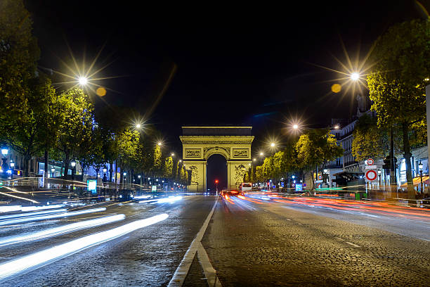 istock Arc de Triomphe Paris city night view from the road 609802108