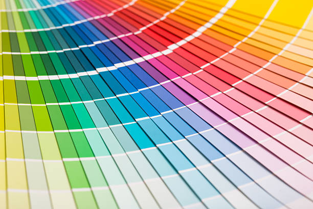 Open Pantone sample colors catalogue. Colour swatches book. Rainbow sample colors catalogue. color image stock pictures, royalty-free photos & images