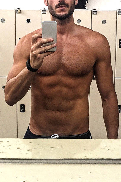 istock muscle fit selfie man portrait 609802688