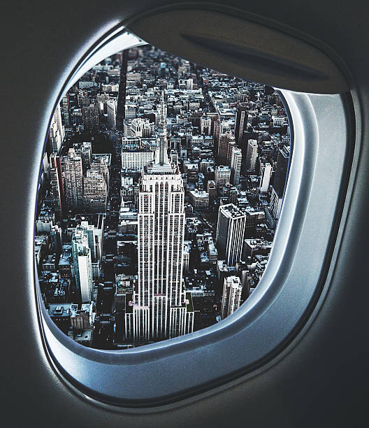 istock Empire state building from an aerial view from the porthole 609803298