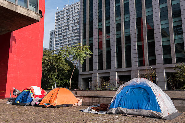 Tents of Homeless Sao Paulo, Brazil - June 26, 2016: Tents of homeless people behind the Museum of Art of Sao Paulo. homeless person stock pictures, royalty-free photos & images