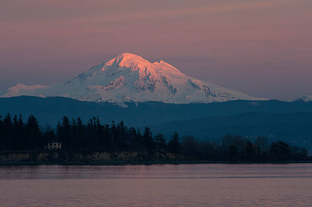 Sunset and Mt. Baker, Washington A beautiful alpenglow touches Mt. Baker during a glorious winter sunset. mt baker stock pictures, royalty-free photos & images