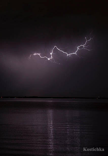 istock Crack of lightning over the bay 609809390
