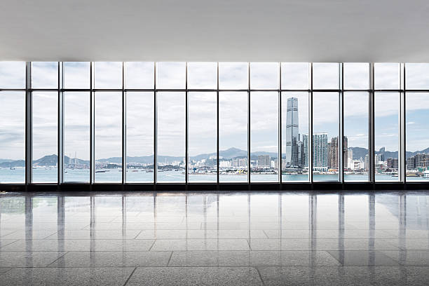 istock modern skyscraper in hong kong from glass window 609809736