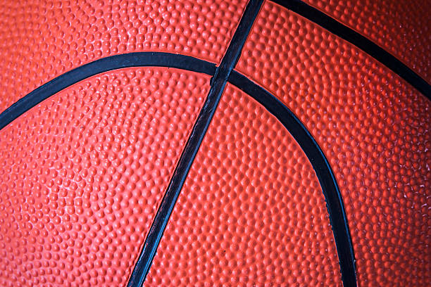 istock Closeup texture of a basketball. 609810414