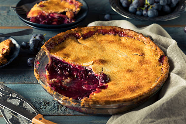 istock Homemade Sweet Concord Grape Pie 609812798