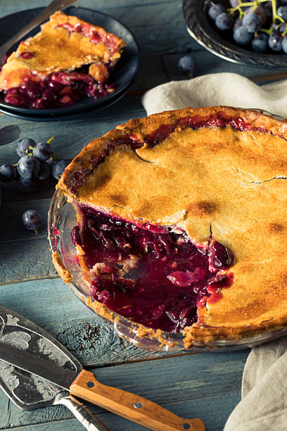 istock Homemade Sweet Concord Grape Pie 609812812