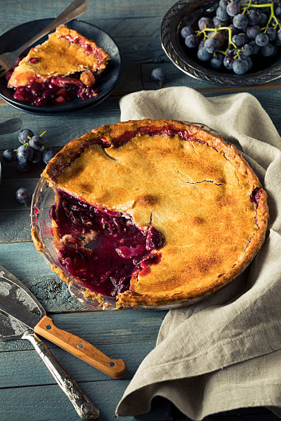 istock Homemade Sweet Concord Grape Pie 609812870