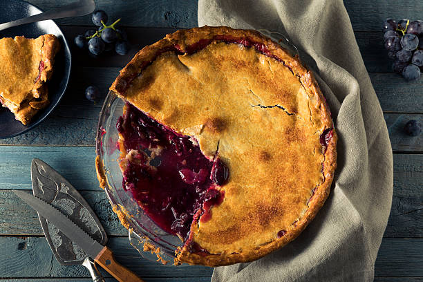 istock Homemade Sweet Concord Grape Pie 609812942