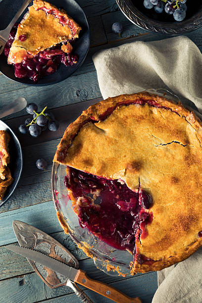istock Homemade Sweet Concord Grape Pie 609813048
