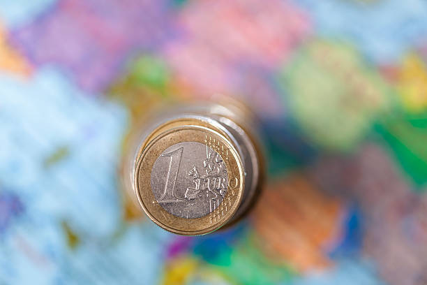 istock euro coin  world  map 609814104