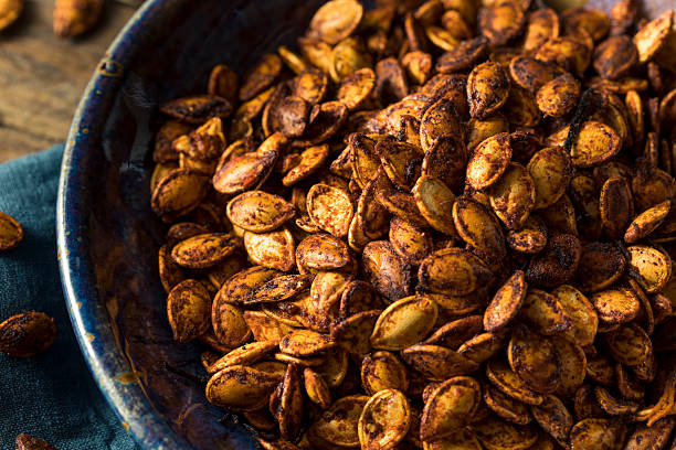 istock Homemade Roasted Spicy Pumpkin Seeds 609815146