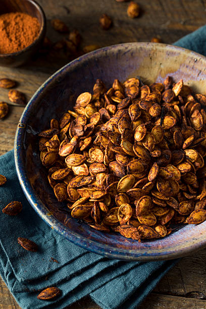 istock Homemade Roasted Spicy Pumpkin Seeds 609815162
