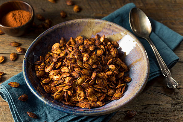 istock Homemade Roasted Spicy Pumpkin Seeds 609815180