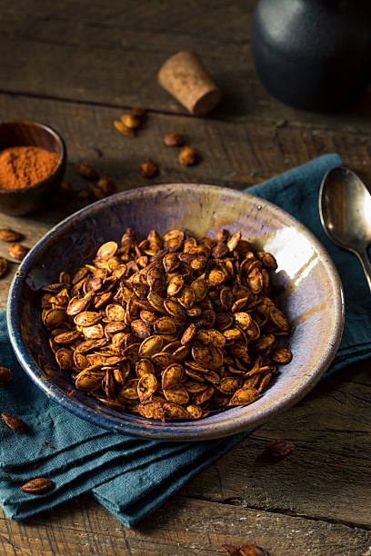 istock Homemade Roasted Spicy Pumpkin Seeds 609815196