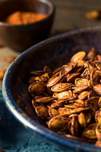 istock Homemade Roasted Spicy Pumpkin Seeds 609815240