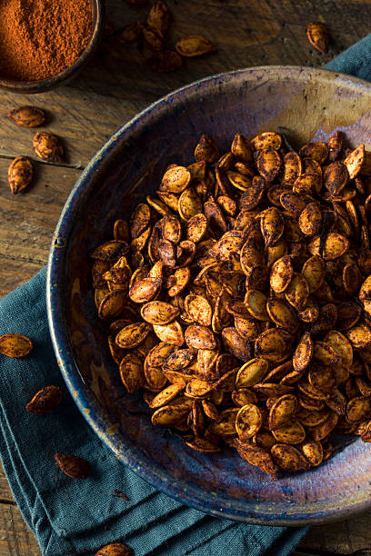 istock Homemade Roasted Spicy Pumpkin Seeds 609815396