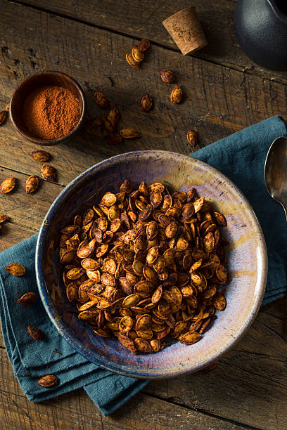 istock Homemade Roasted Spicy Pumpkin Seeds 609815412