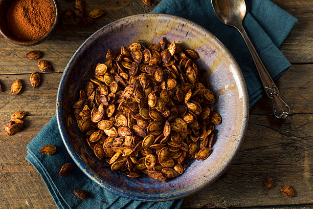 istock Homemade Roasted Spicy Pumpkin Seeds 609815532