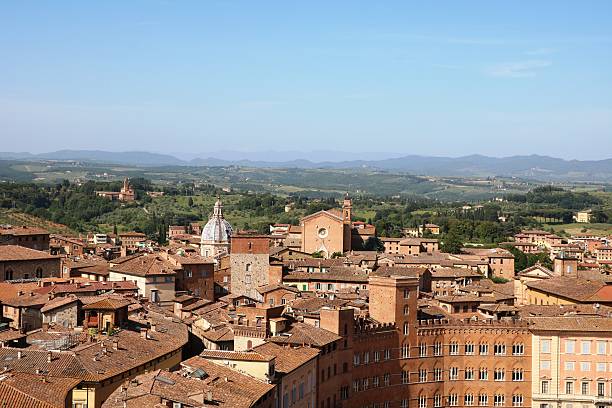 View to Piazza del Campo Basilica San Francesco, Siena  Italy View to Piazza del Campo to Basilica di San Francesco in Siena, Tuscany Italy derby city stock pictures, royalty-free photos & images