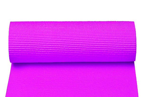 istock Purple yoga mat isolated on white 609815994