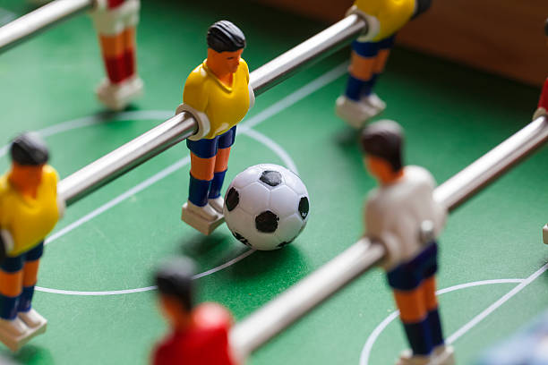 foosball table soccer . football players sport teame stock photo