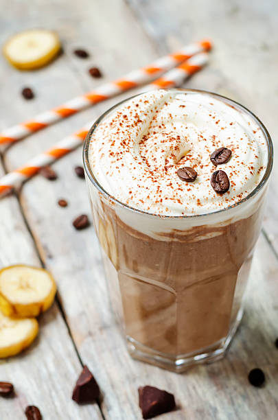 istock coffee chocolate banana smoothie with coconut whipped cream 609816668