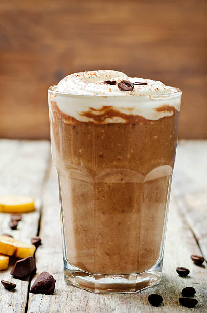 istock coffee chocolate banana smoothie with coconut whipped cream 609816676