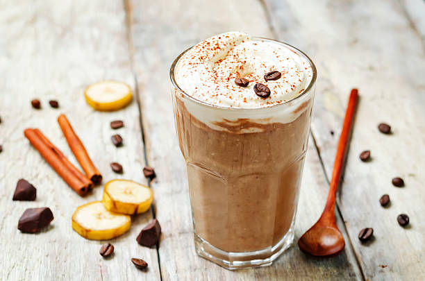 istock coffee chocolate banana smoothie with coconut whipped cream 609816686
