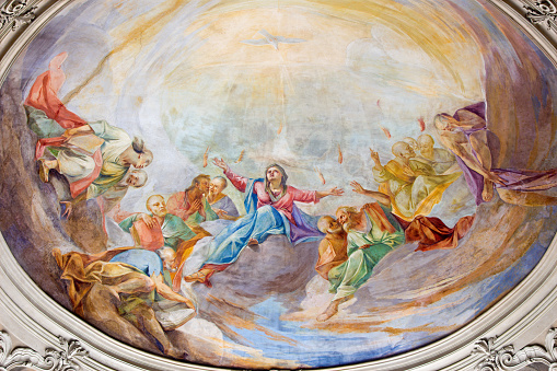 Brescia, Italy - May 22, 2016: Brescia - The fresco of Pentecost on side cupola in church Chiesa di Santa Maria del Carmine (Pentecost chapel) by Giovanni Luca Molinari (1724).