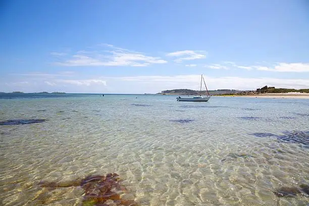 Crystal clear waters at Pentle Bay, Tresco, Isles of Scilly, Cornwall, England.