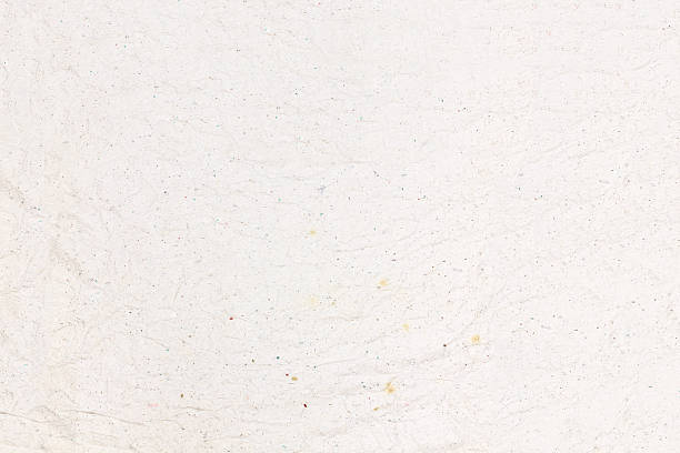 istock Recycled crumpled white paper texture or paper background for design. 609820794