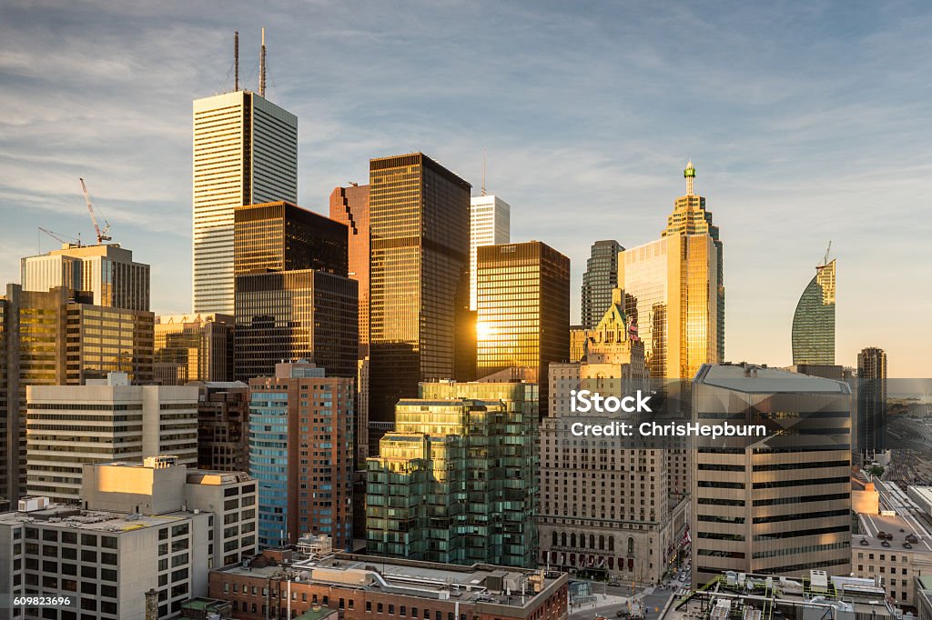 Cityscape of the financial district in Toronto, Ontario, Canada Wide angle view of warm sunlight illuminating the financial district of Toronto, Ontario, Canada. Toronto Stock Photo