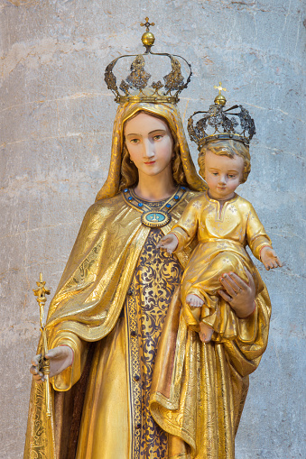 Brescia, Italy - May 22, 2016: Brescia - The carved polychrome statue of Madonna in church Chiesa di Santa Maria del Carmine by unknown artist.
