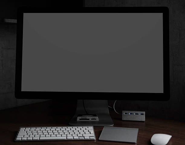 istock computer monitor with blank screen at night 609824906