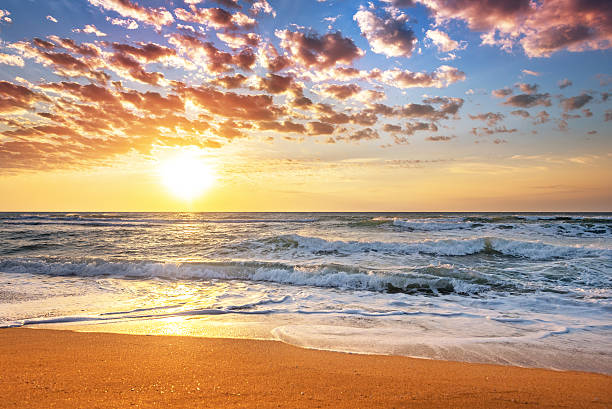 kolorowy ocean beach sunrise. - carmen island zdjęcia i obrazy z banku zdjęć