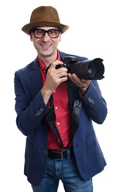 photographer holds a camera. isolated over white background