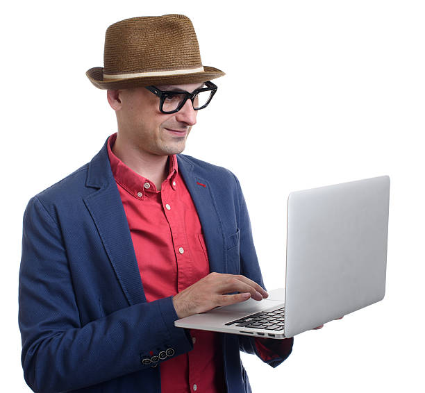 istock fashionable man use a laptop 609827936
