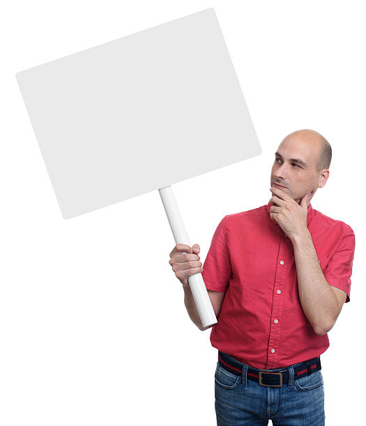 istock Casual man with a banner 609830036