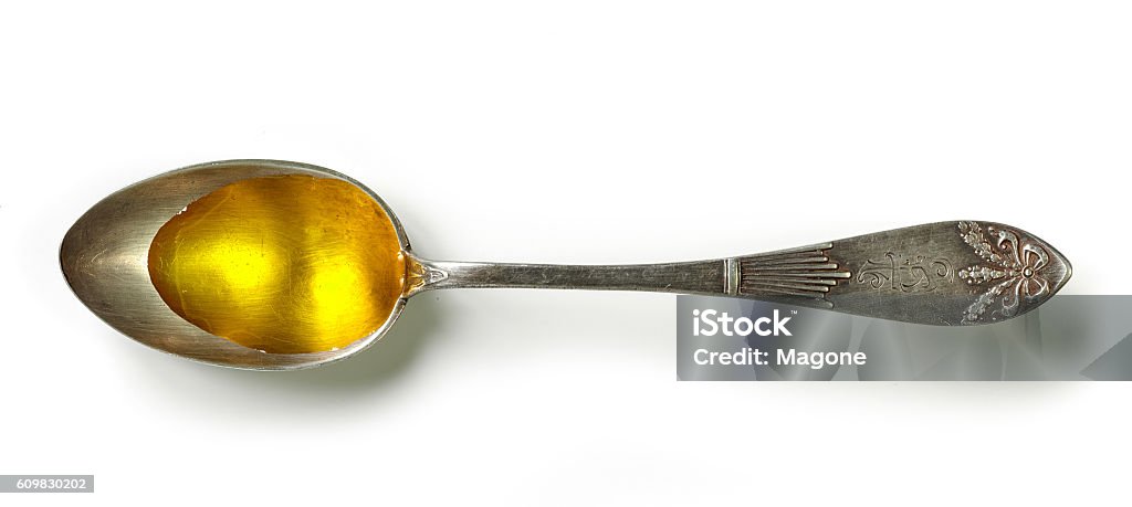 cucharada de aceite de cocina - Foto de stock de Cuchara libre de derechos