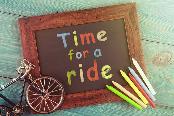 istock Time for a ride -  crayons on the chalkboard 609830294
