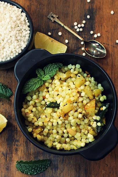istock Sabudhana Khichdi - spiced Tapioca pearls , selective focus 609830610